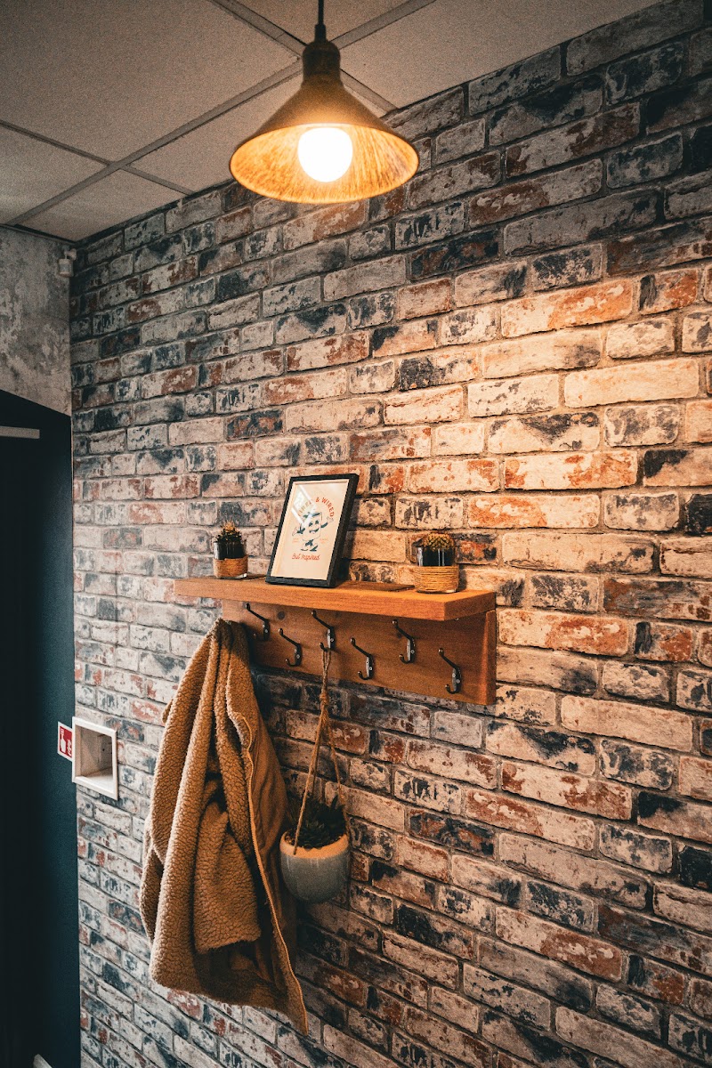 Cozy rustic interior with brick walls and warm lighting at The Burlam Bear in Middlesbrough